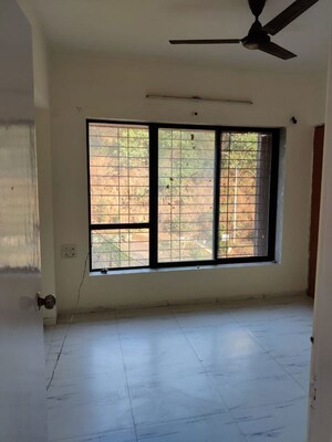 Room in 2 BHK Apartment at Royal Palms Garden View, Goregaon East – for Rent