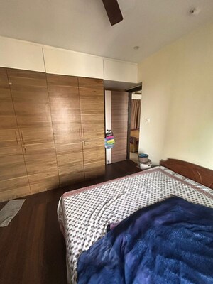 Bedroom in 2 BHK Apartment at Chandak Cornerstone, Worli – for Rent