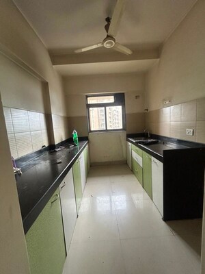 Kitchen in 2 BHK Apartment at Madhav Palacia, Ghodbunder Road – for Rent
