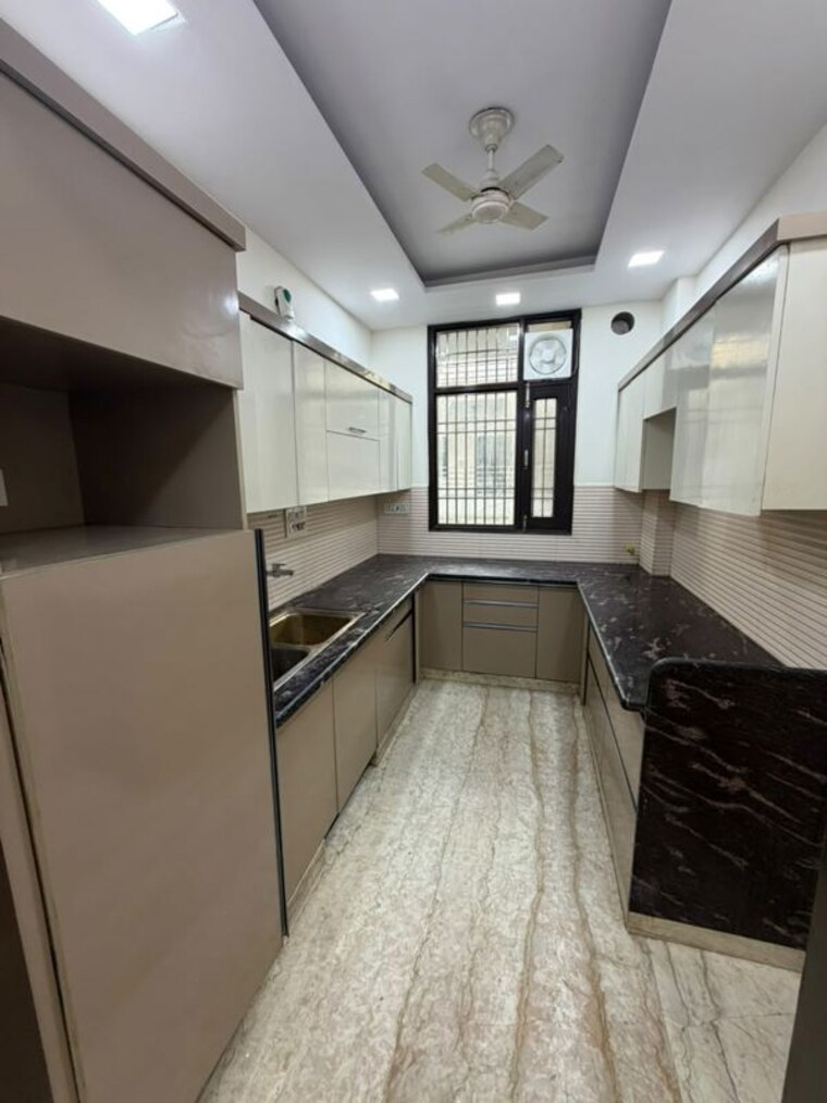 Kitchen, paschim vihar 2 Bedroom 100 Sq.Yd. Builder Floor In Paschim Vihar Delhi 10458887