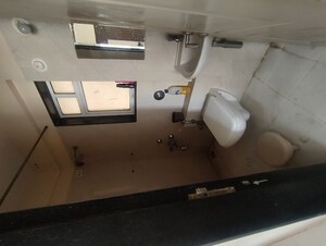 Bathroom in 2 BHK Apartment at Godrej Emerald, Ghodbunder Road – for Rent