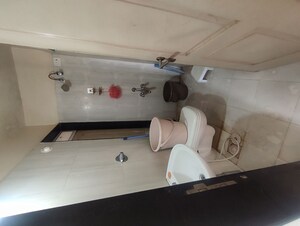 Bathroom in 2 BHK Apartment at Cosmos 27 Gbr, Kasarvadavali – for Rent
