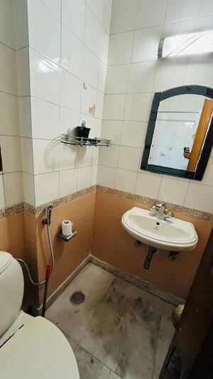 Bathroom in 3 BHK Builder Floor at Kalkaji – for Rent