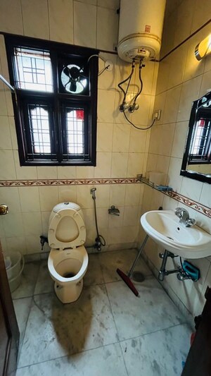 Bathroom in 3 BHK Builder Floor at Kalkaji – for Rent