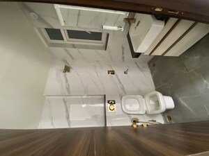 Bathroom in 3.5 BHK Builder Floor at Raj One Good Earth, Sector 71 – for Rent