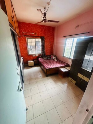Living Room in 2 BHK Apartment at Abhijit Park, Thergaon – for Rent