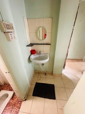 Bathroom in 2 BHK Apartment at Abhijit Park, Thergaon – for Rent
