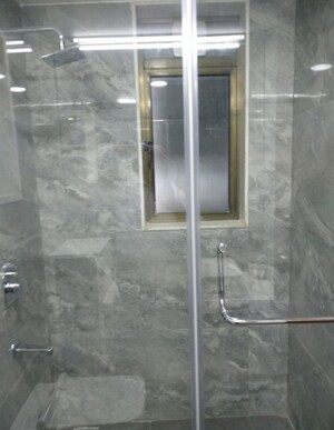 Bathroom in 4 BHK Apartment at Dynamix Woodlands Apartment, Malad East – for Rent