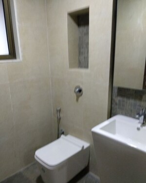 Bathroom in 4 BHK Apartment at Dynamix Woodlands Apartment, Malad East – for Rent