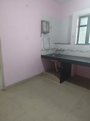 Kitchen in 1 BHK Apartment at Kamgar Putala Vasahat – for Sale