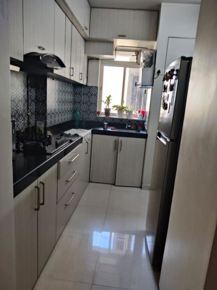 Kitchen, lodha-amara 2 Bedroom 672 Sq.Ft. Apartment In Kolshet Road Thane 10459270