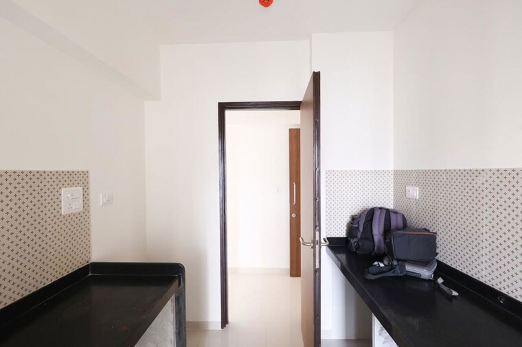 Kitchen, lodha-amara-tower-24-and-25 2 Bedroom 722 Sq.Ft. Apartment In Kolshet Road Thane 10459280