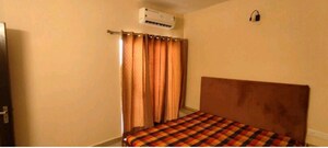 Bedroom in 2 BHK Apartment at Nimbus Express Park View - II, Chi V Greater Noida – for Rent