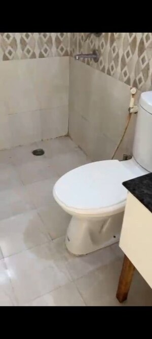 Bathroom in 3 BHK Apartment at Niho Saffron Scottish Garden, Ahinsa Khand 2 – for Sale