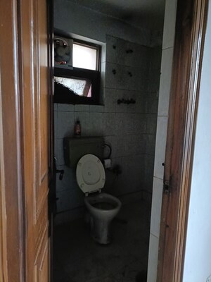 Bathroom in 2 BHK Apartment at Vasundhara Enclave – for Rent