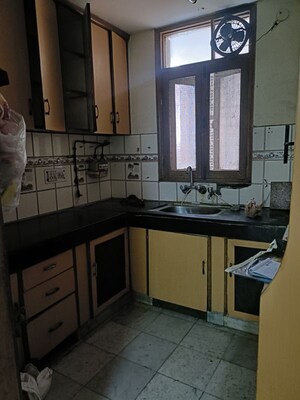 Kitchen in 3 BHK Apartment at Vasundhara Enclave – for Sale