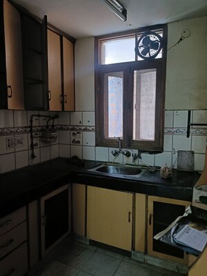 Kitchen in 3 BHK Apartment at Vasundhara Enclave – for Sale