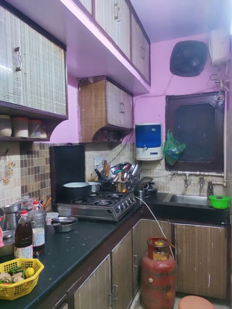 Kitchen, housing board colony 3 Bedroom 100 Sq.Yd. Apartment In Housing Board Colony Faridabad 10459408