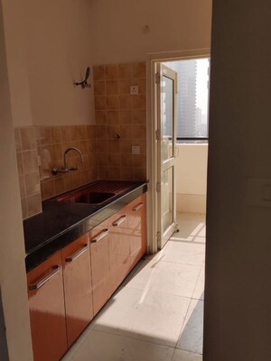 Kitchen in 2 BHK Apartment at AWHO Shanti Vihar, Sector 95 – for Rent