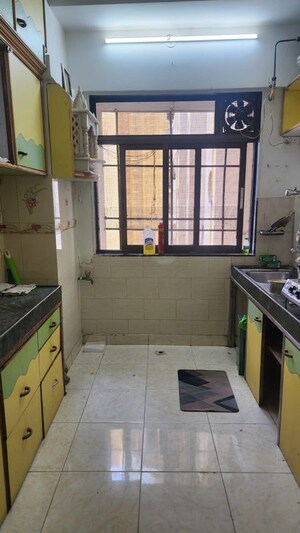 Kitchen in 1 BHK Apartment at Lokhandwala Residency, Worli – for Rent