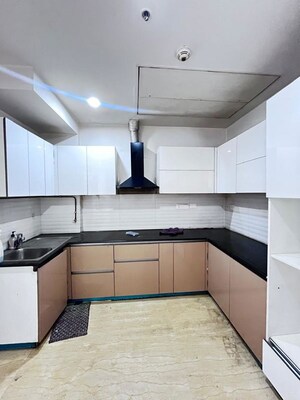 Kitchen in 3.5 BHK Apartment at Mahagun Mezzaria, Sector 78 – for Rent
