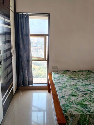 Master Bedroom in 2 BHK Apartment at DB Parkwoods, Kasarvadavali – for Rent