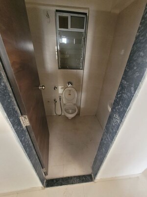 Bathroom in 1 BHK Apartment at Je And Vee Om Trimurti, Malad East – for Rent