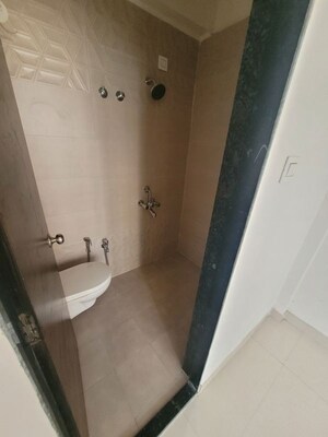 Bathroom in 1 BHK Apartment at Je And Vee Om Trimurti, Malad East – for Rent