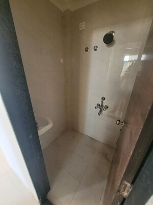Bathroom in 1 BHK Apartment at Je And Vee Om Trimurti, Malad East – for Rent