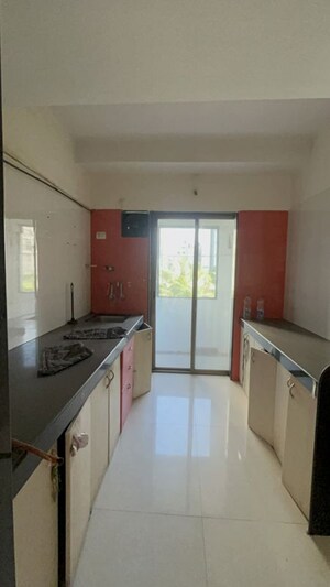 Kitchen in 2 BHK Apartment at Shanti Gardens , Mira Road – for Rent