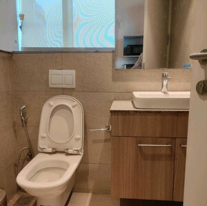 Bathroom in Studio Apartment at Conscient One Service Apartment, Sector 109 – for Sale