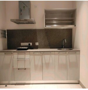 Kitchen in Studio Apartment at Conscient One Service Apartment, Sector 109 – for Sale