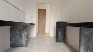 Kitchen in 2 BHK Apartment at Godrej Emerald, Ghodbunder Road – for Rent