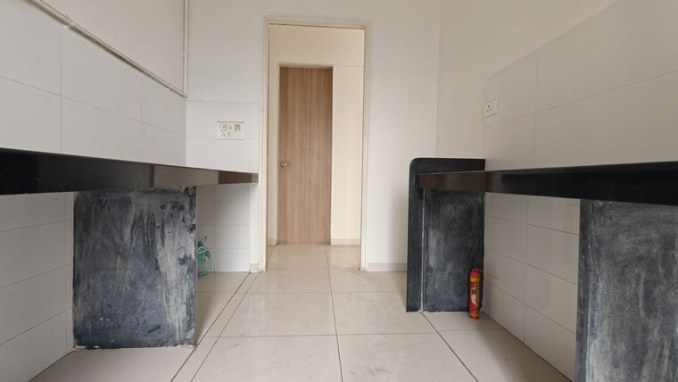 Kitchen, godrej-emerald 2 Bedroom 550 Sq.Ft. Apartment In Ghodbunder Road Thane 10459642