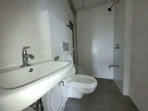 Bathroom in 2 BHK Apartment at Godrej Emerald, Ghodbunder Road – for Rent