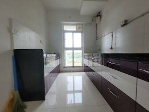 Kitchen in 2 BHK Apartment at Godrej Emerald, Ghodbunder Road – for Rent