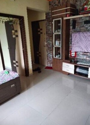 Living Room in 2 BHK Apartment at Titwala – for Sale