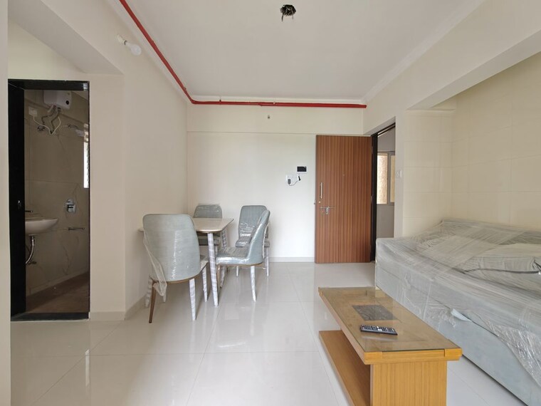 Living Room, raunak-bliss 1 Bedroom 430 Sq.Ft. Apartment In Ghodbunder Road Thane 10459801