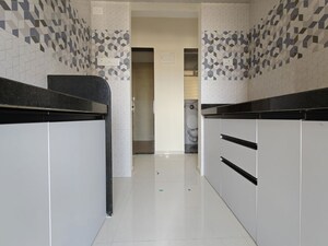 Kitchen in 1 BHK Apartment at Raunak Bliss, Ghodbunder Road – for Rent