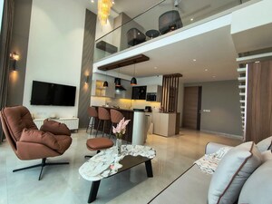 Living Room in Studio Apartment at M3M Corner Walk, Sector 74 – for Rent