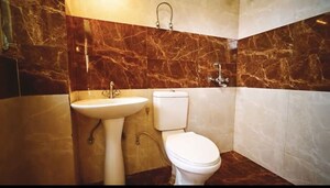 Bathroom in 2 BHK Apartment at Gulmohur Garden, Raj Nagar Extension – for Sale