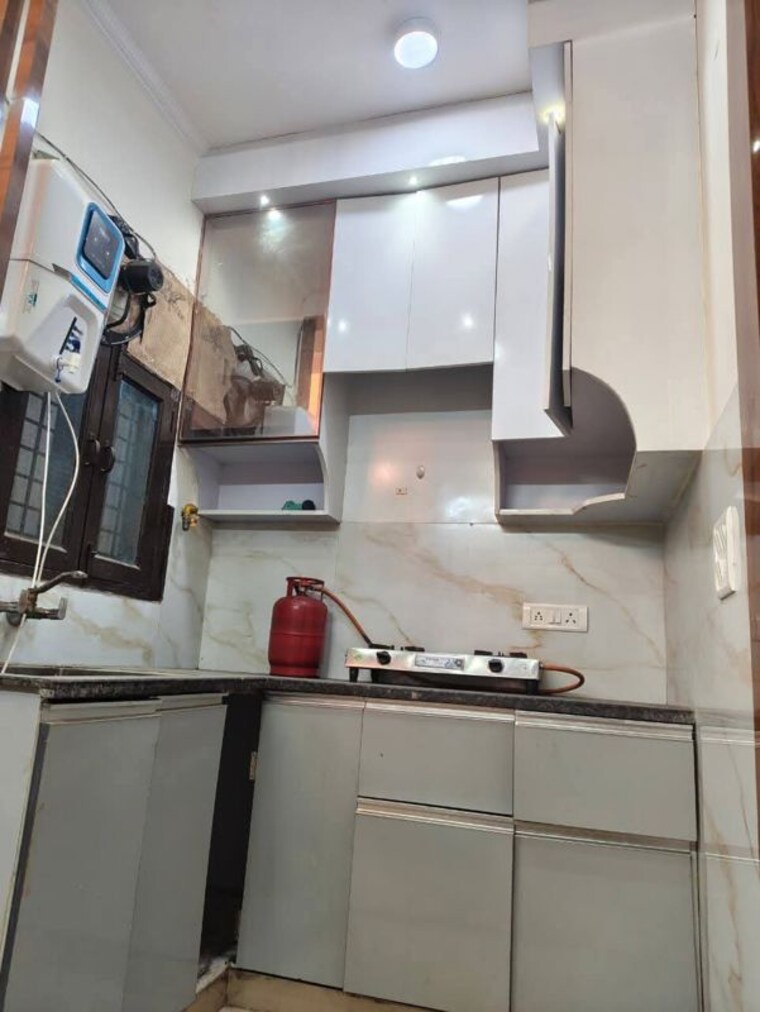 Kitchen, lucky-the-palm-valley 2 Bedroom 950 Sq.Ft. Builder Floor In Sector 1 Greater Noida Greater Noida 10459911