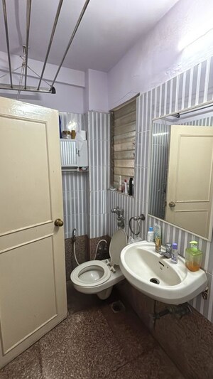Bathroom in 2 BHK Apartment at Anand CHS Andheri East, Andheri East – for Rent