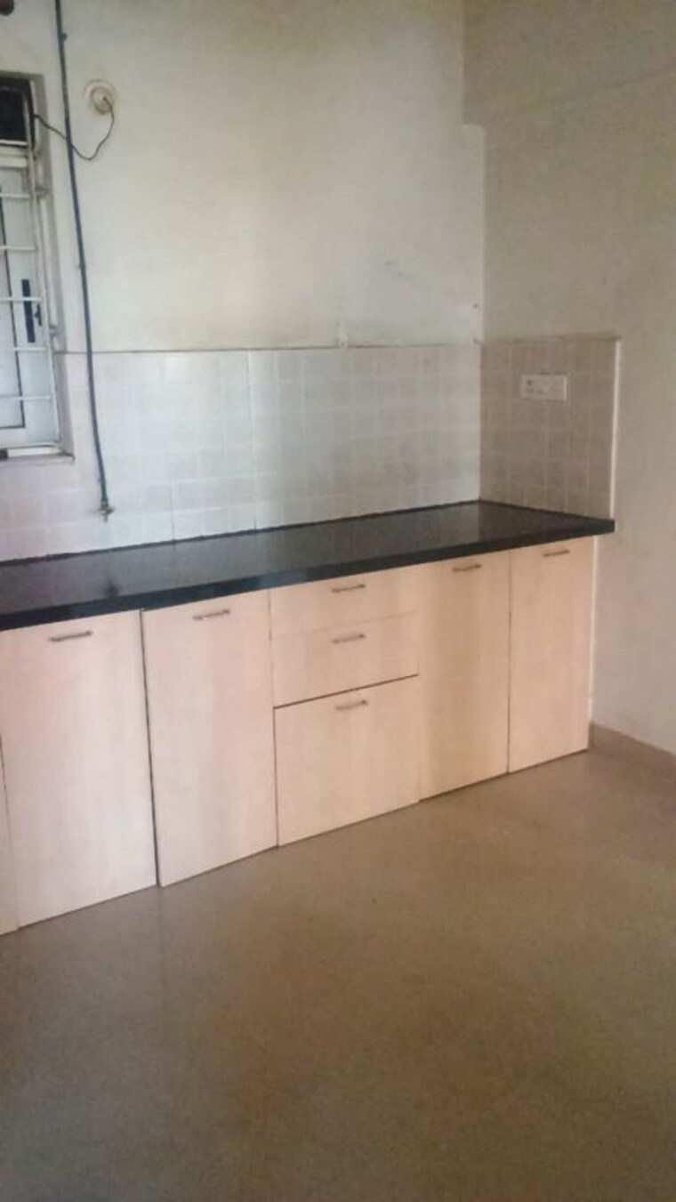 Kitchen, amanora-trendy-homes 2.5 Bedroom 900 Sq.Ft. Apartment In Hadapsar Pune 10459967
