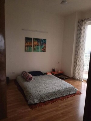 Bedroom in 2 BHK Apartment at Puri Emerald Bay, Sector 104 – for Rent