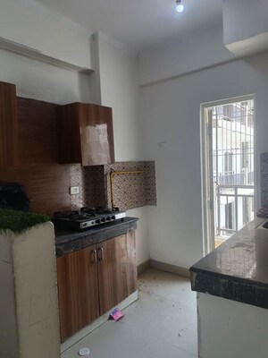 Kitchen in 2 BHK Apartment at Aims Golf City, Sector 75 – for Rent