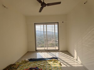 Bedroom in 2 BHK Apartment at Mahavir Kalpavruksha, Ghodbunder Road – for Rent