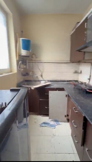 Kitchen in 2 BHK Apartment at Grah Avas Green View Heights, Raj Nagar Extension – for Rent