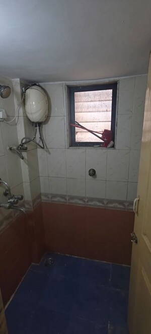 Bathroom in 2 BHK Apartment at Kopar Khairane – for Rent