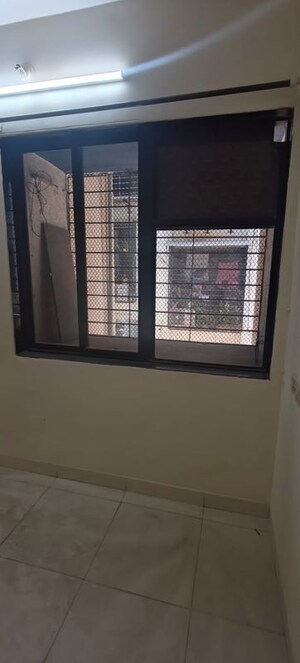 Room in 2 BHK Apartment at Kopar Khairane – for Rent